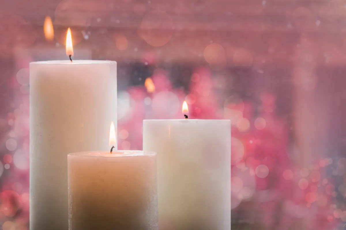 Lit candles releasing volatile organic compounds